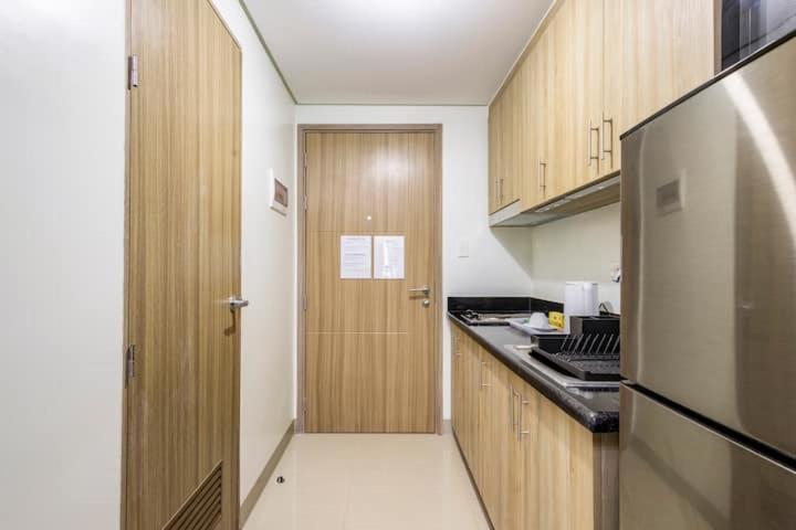 מנילה Shore 2 Residences 1Br Deluxe Room In Moa Complex מראה חיצוני תמונה